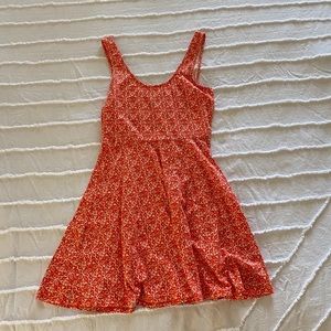 orange and white fit and flare dress